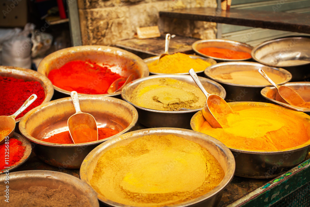 Various colored spices on the Mahane Yehuda Market in Jerusalem.