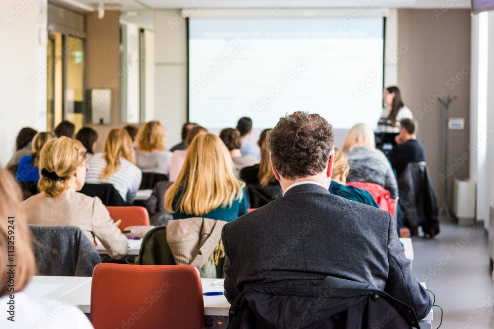 Audience at business conference.