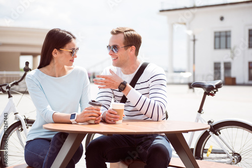 Man and woman sitting at cafe