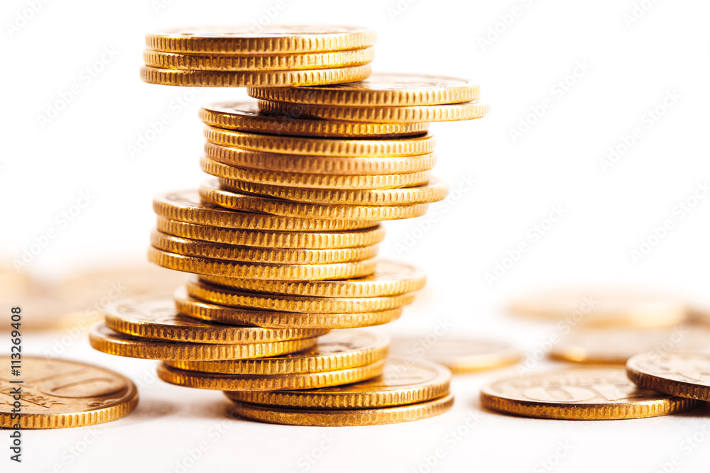 Coins stacked on each other in different positions Coins stacked on each other in different positions
