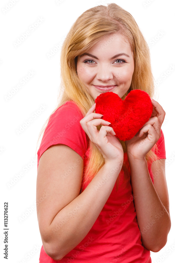 Woman blonde girl holding red heart love symbol Woman blonde girl holding red heart love symbol