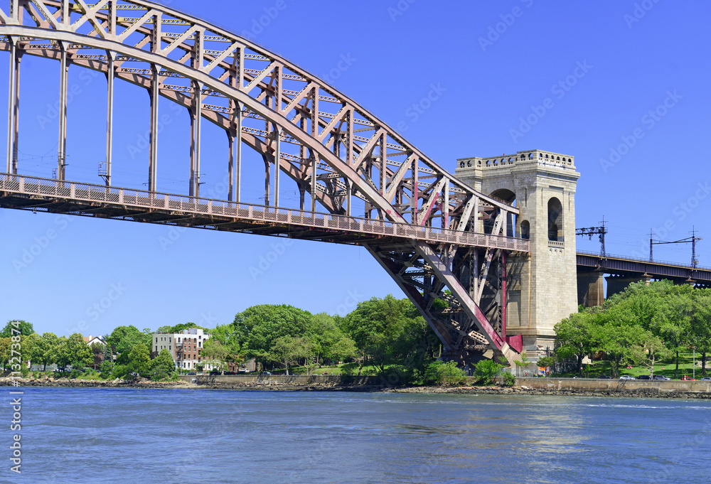 Fototapeta premium The Hell Gate Bridge (East River Arch Bridge) in New York City is a railroad only bridge, not used for passenger cars, and was a model for the Sydney Harbour Bridge in Australia