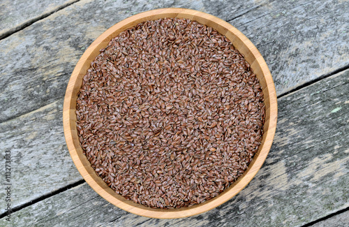 Flax seeds in bamboo bowl