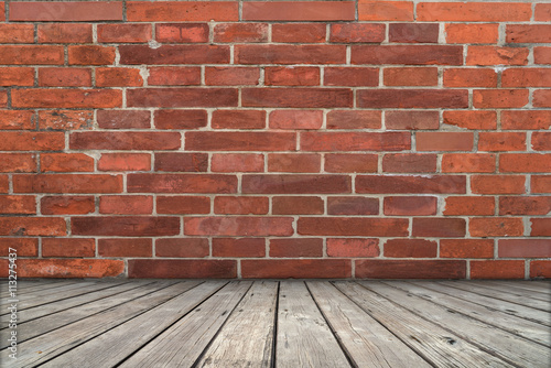 Empty room background of brick wall with wooden floor  Ideal for
