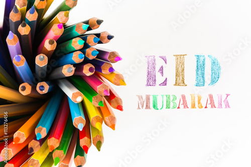 Eid Mubarak  traditional Muslim greeting.Paint by color pencil with color pencils on white background