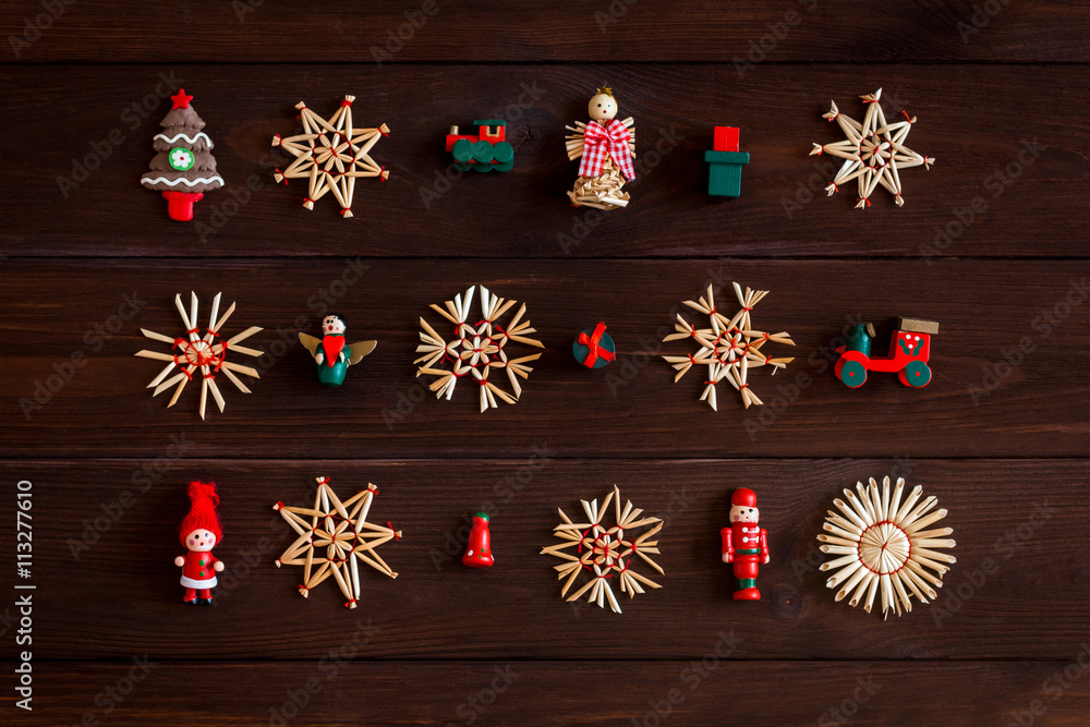 Christmas toys on wooden background, flat lay, top view Christmas toys on wooden background, flat lay, top view