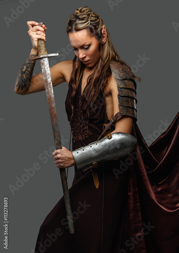 Elf woman warrior with sword.
