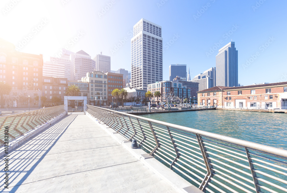 empty footpath on bridge with cityscape and skyline of san franc