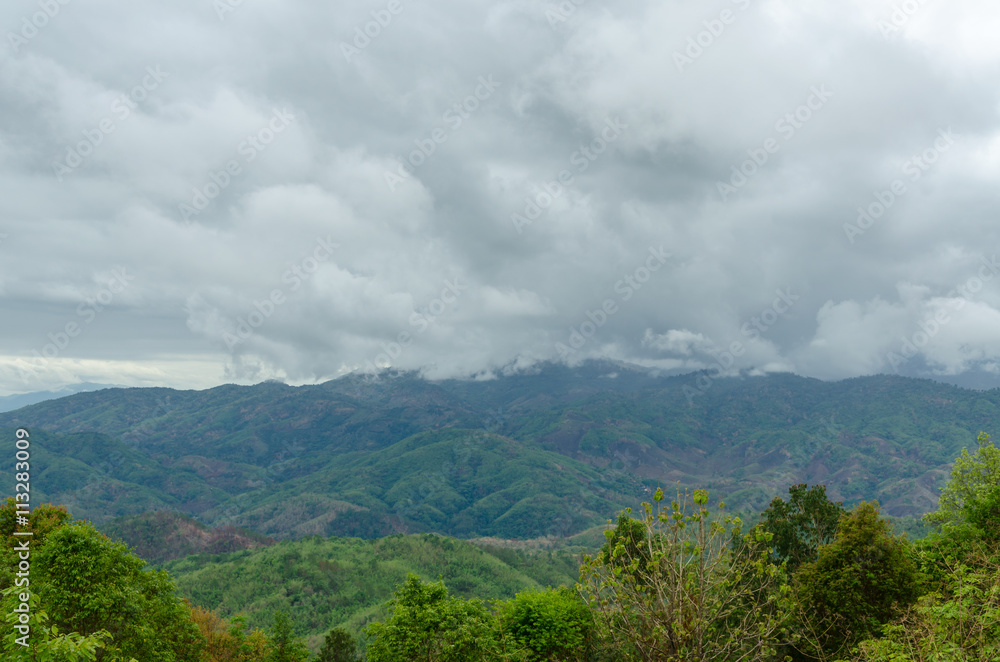 Top view of naturel mountains landscape with black rain clouds in the rainy season