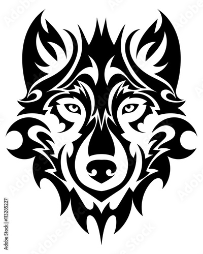 Beautiful wolf tattoo.Vector wolf's head as a design element on isolated background