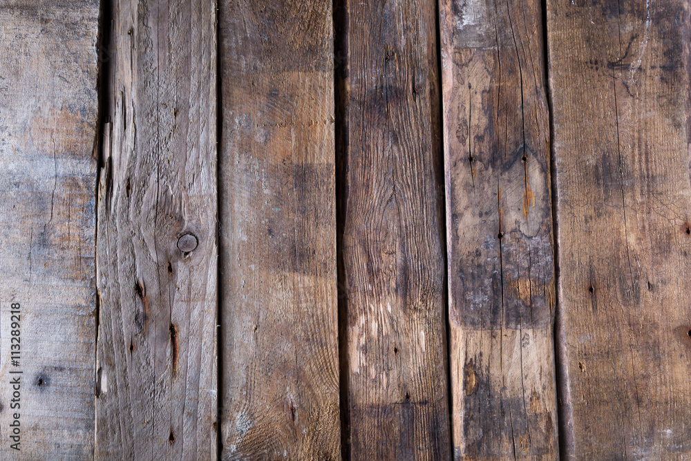 Fototapeta premium Wooden background from old raw boards 