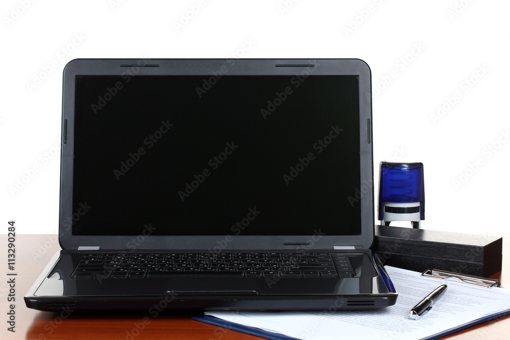 opened notebook with office objects on a wooden table isolated on white background opened notebook with office objects on a wooden table isolated on white background