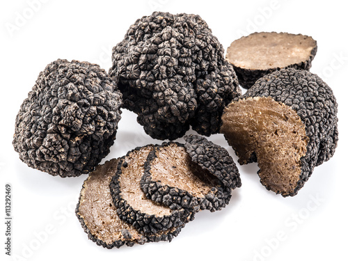 Black truffles isolated on a white background.