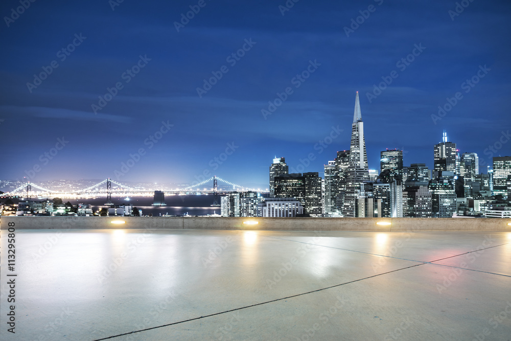 empty pavement with cityscape and skyline of san francisco at tw empty pavement with cityscape and skyline of san francisco at tw
