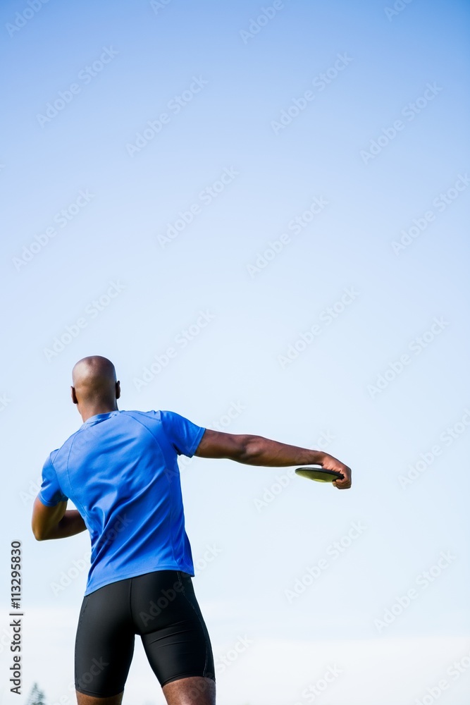 Athlete about to throw a discus Athlete about to throw a discus