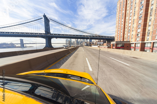 New York City Yellow Taxi Cab by Manhattan Bridge © Darren Baker