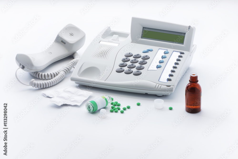 Telephone set and medicines in tablets or drops Telephone set and medicines in tablets or drops