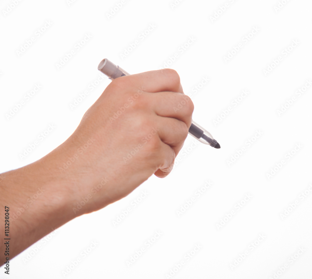 Male hand holding a marker Male hand holding a marker