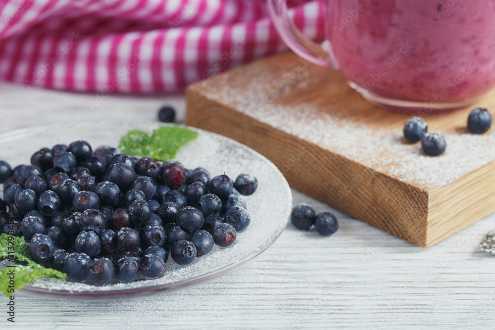 Delicious bilberry smoothie with fresh berries. Fresh yogurt wit Delicious bilberry smoothie with fresh berries. Fresh yogurt wit