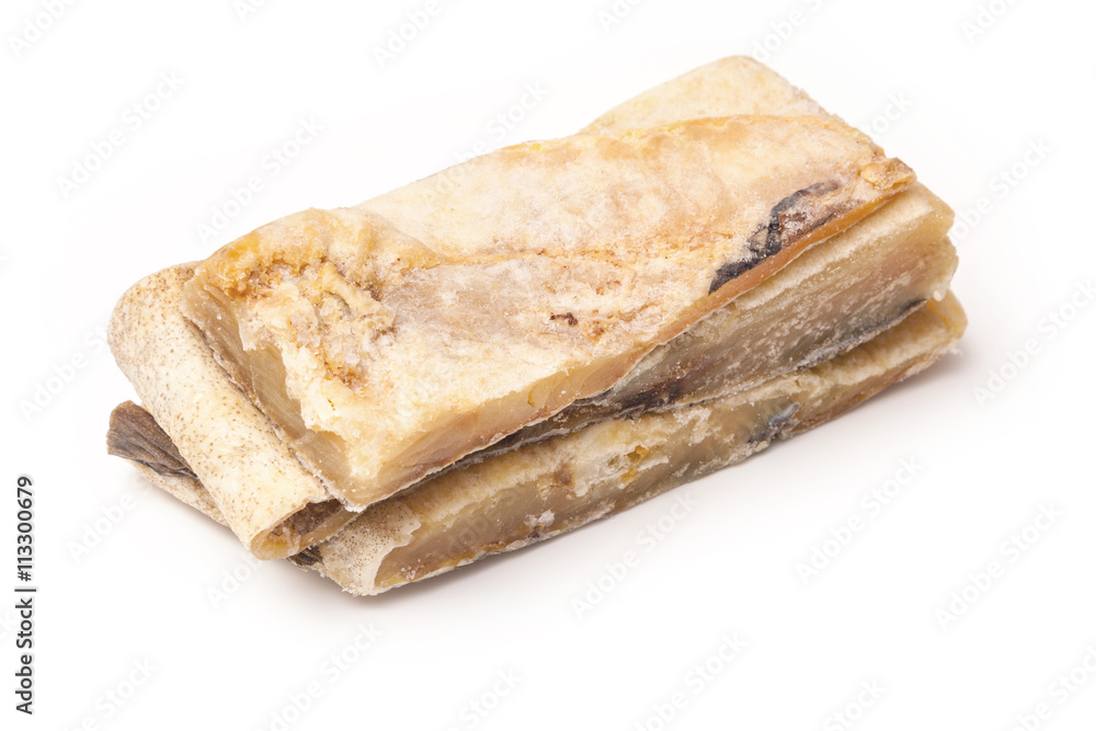 Salted codfish or salt cod isolated on a white background