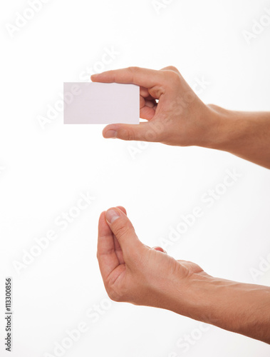 Male hand holding an empty business card
