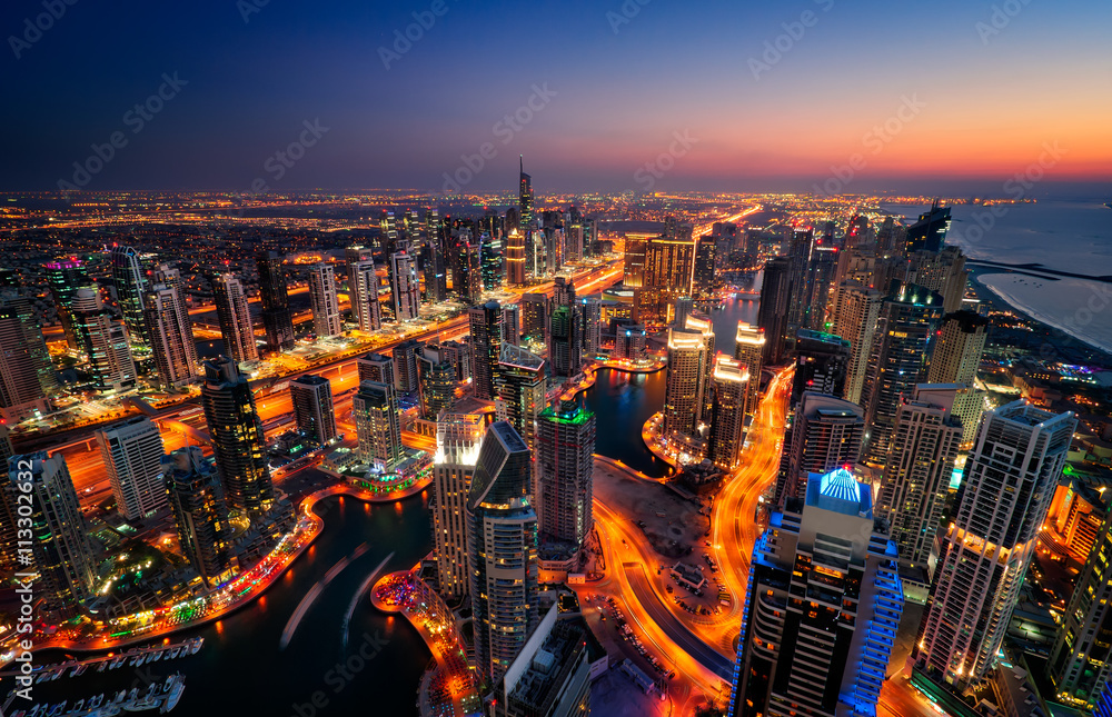 Naklejka premium Colorful sunset. Dubai marina skyline, United Arab Emirates.