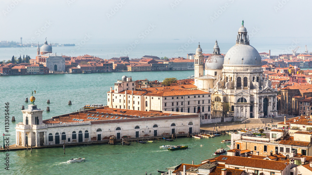 View from the top of San Marco bell tower of roman catholic church Santa Maria della Salute in Venice, Italy.