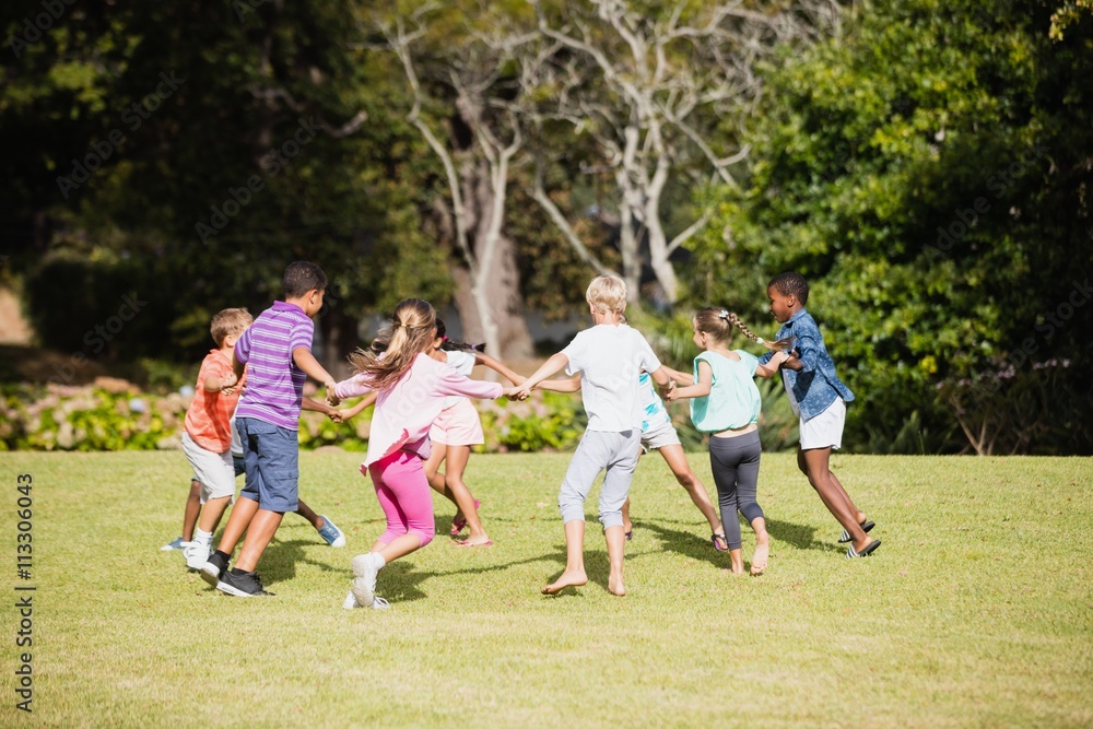 Kids playing together during a sunny day