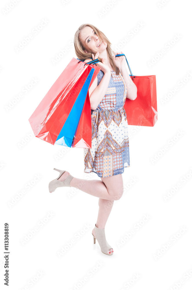 Lovely woman dressed in nice clothes doing shopping Lovely woman dressed in nice clothes doing shopping