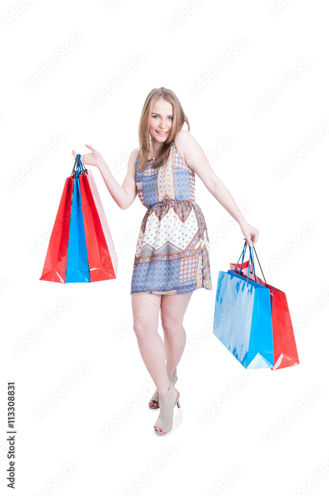 Playful young shopaholic enjoying leisure and relaxing at shoppi Playful young shopaholic enjoying leisure and relaxing at shoppi