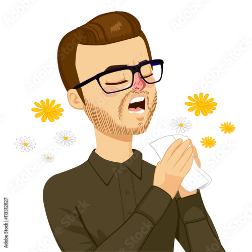 Young man going to sneeze because of spring allergy making funny face