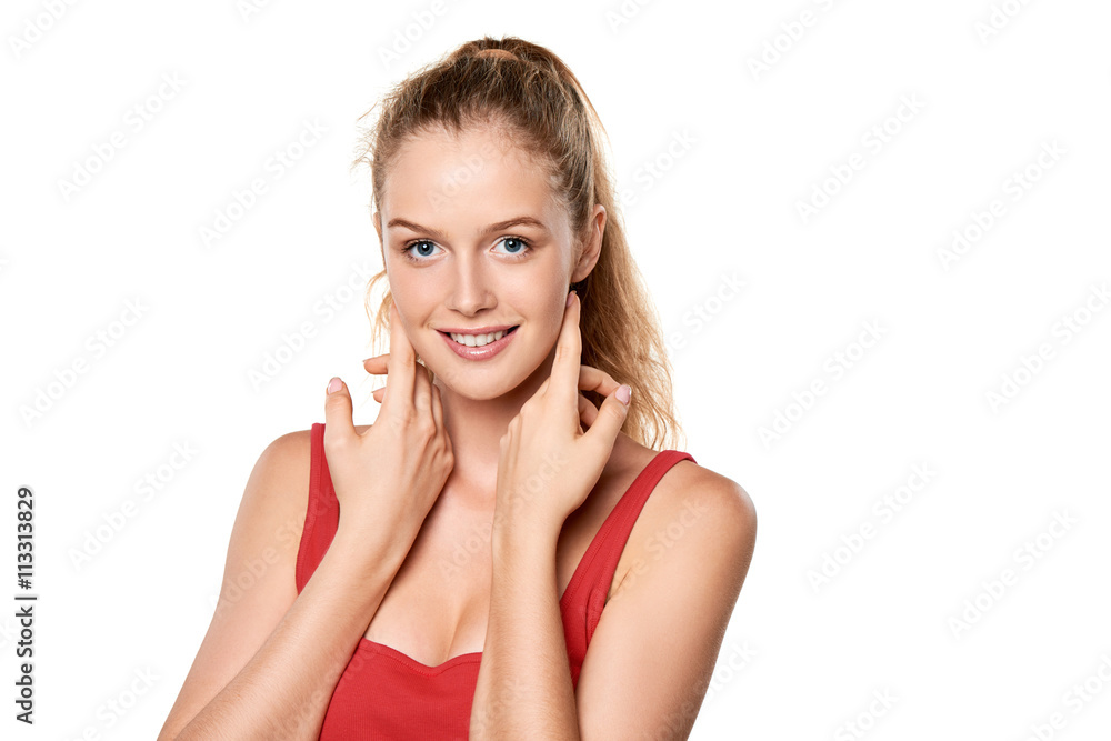 Beauty portrait of young woman touching her face skin Beauty portrait of young woman touching her face skin
