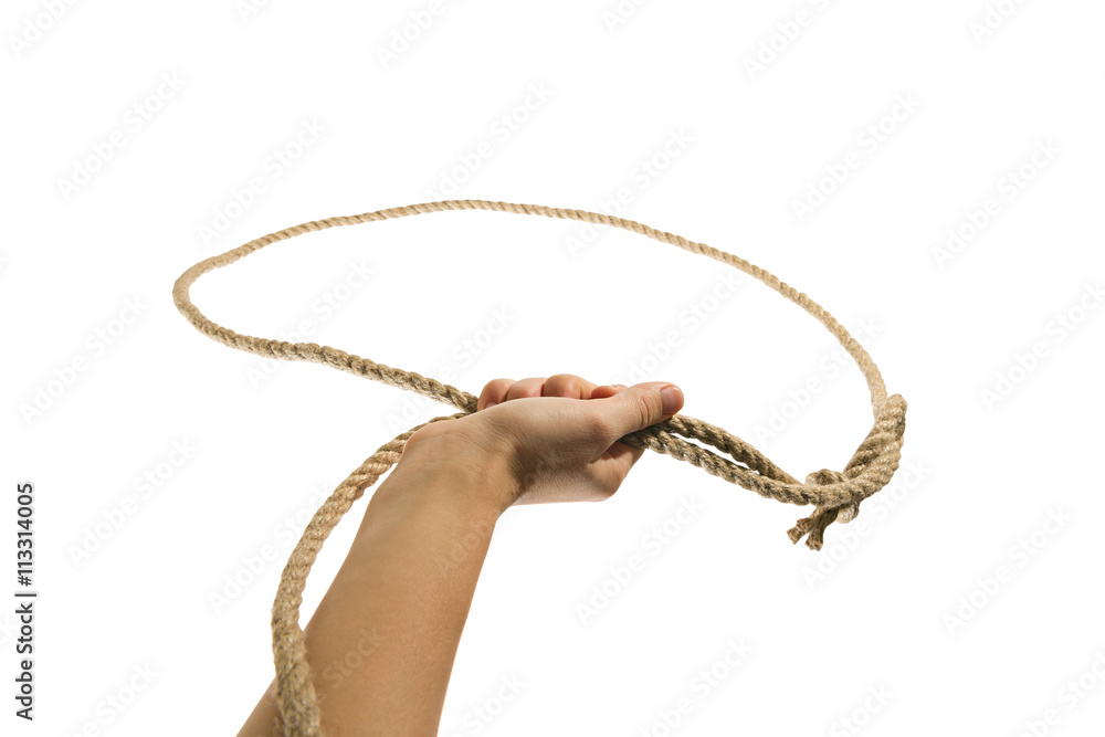 The hand throws a lasso on white, isolated background The hand throws a lasso on white, isolated background