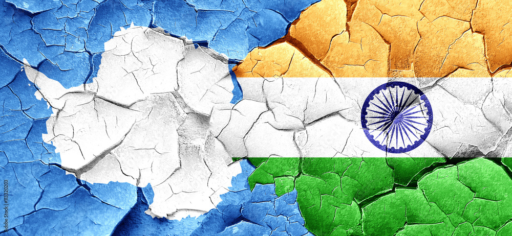 antarctica flag with India flag on a grunge cracked wall
