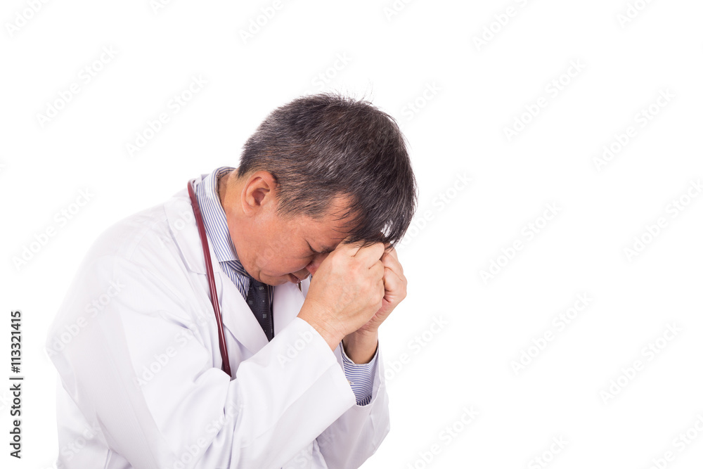 Depressed and disappointed Asian medical doctor with hands on face Depressed and disappointed Asian medical doctor with hands on face