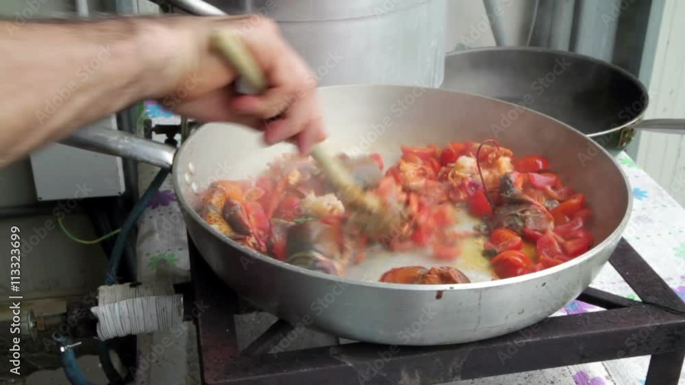 preparation of Lobster with tomatoes in a pan for Italian pasta preparation of Lobster with tomatoes in a pan for Italian pasta