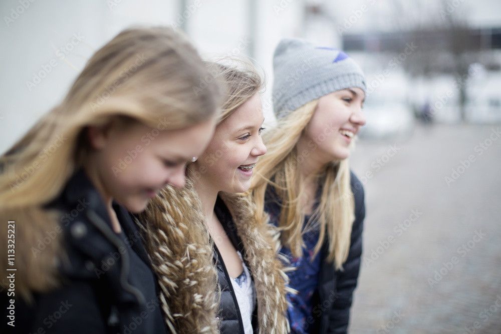 Happy female friends on street Happy female friends on street