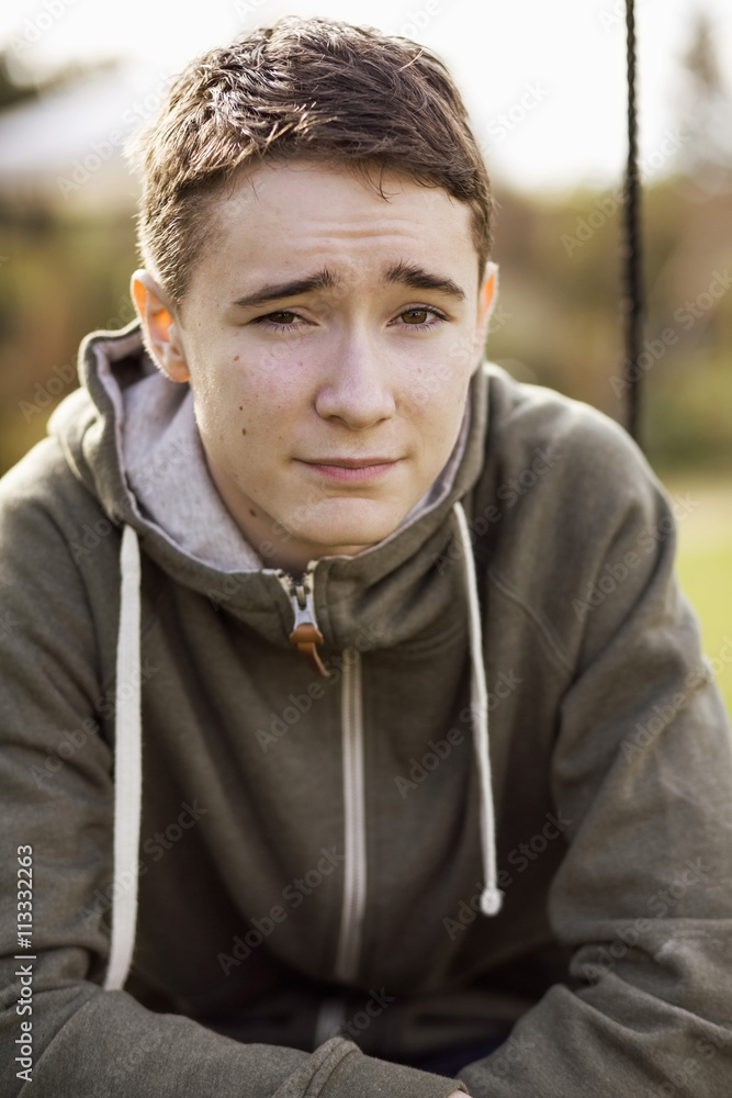 Portrait of confident teenage boy at garden Portrait of confident teenage boy at garden