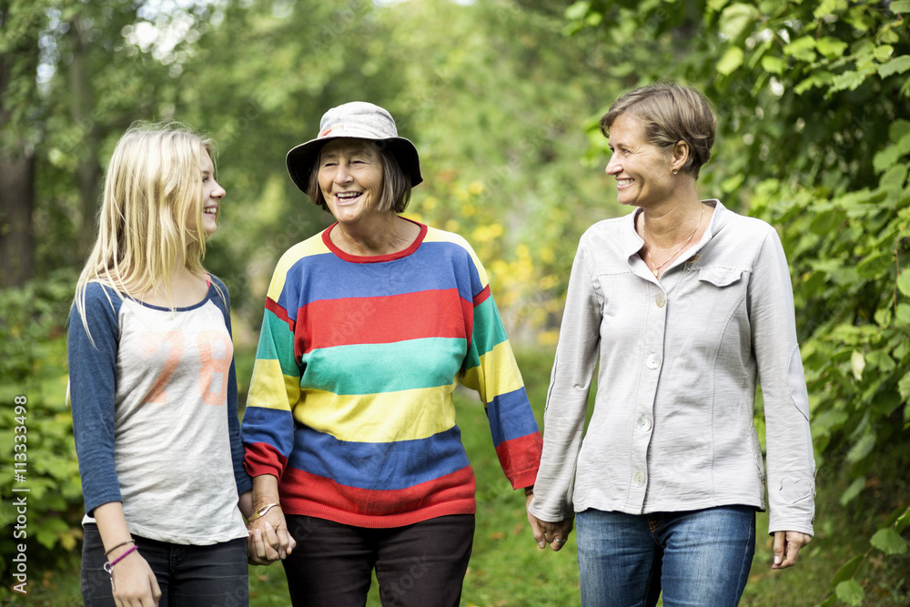 Happy three generation females at park Happy three generation females at park