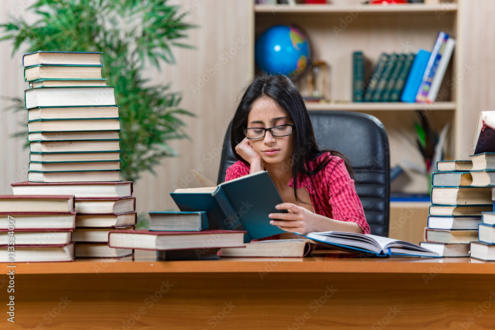 Young female student preparing for college school exams Young female student preparing for college school exams