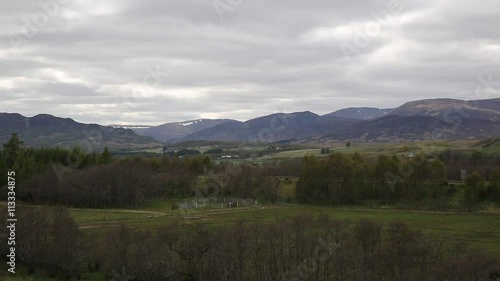 View from Ruthven Barracks Cairgorn national park Scotland of A9 road and countryside pan