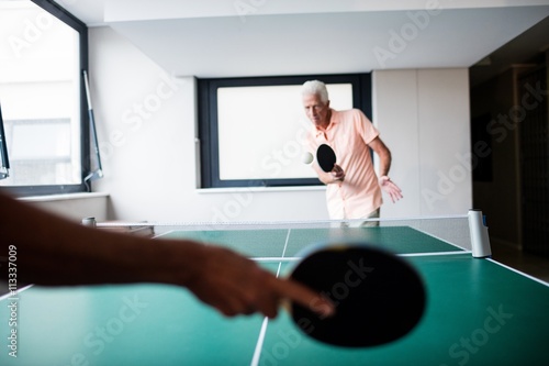 Obraz na płótnie Senior playing ping pong
