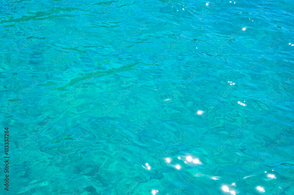 Background of clear azure sea water top view Background of clear azure sea water top view