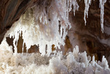 natural grotto  with white  salty stalactites