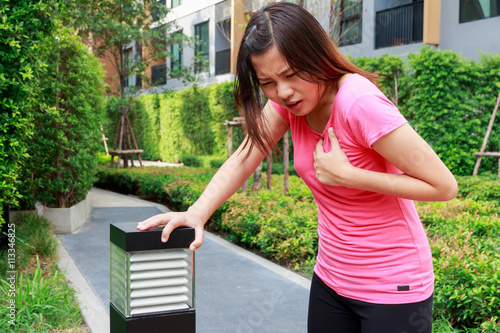 Tablou pe pânză Sporty woman having heart attack - Angina Pectoris, Myocardial