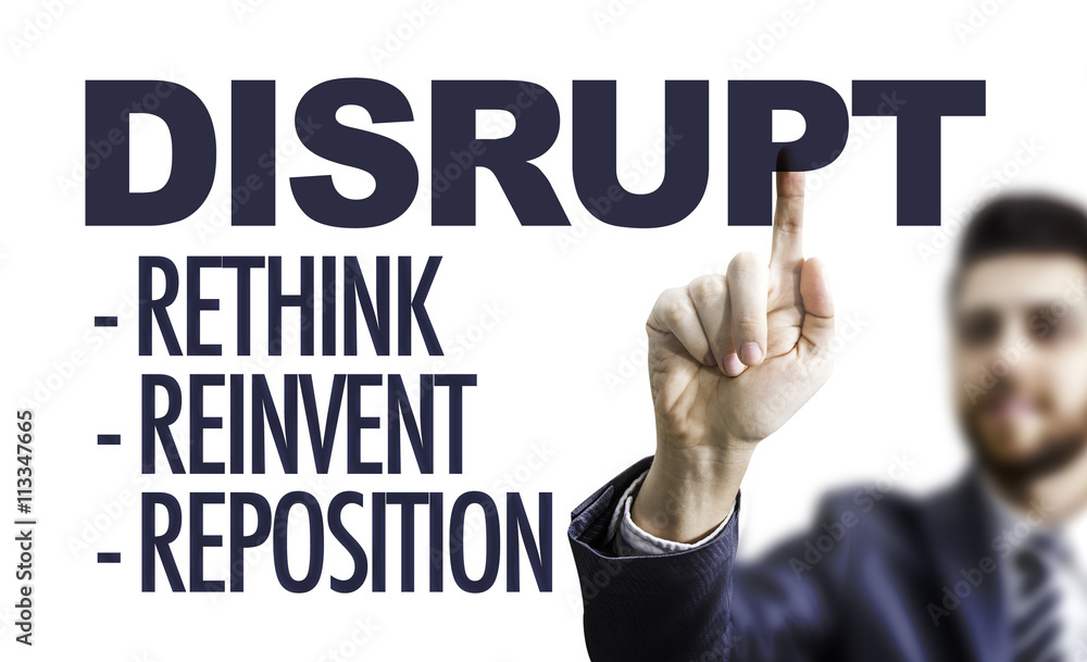 Business man pointing the text: Disrupt Business man pointing the text: Disrupt