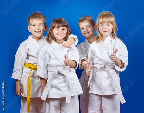 Children in karategi are showing finger super