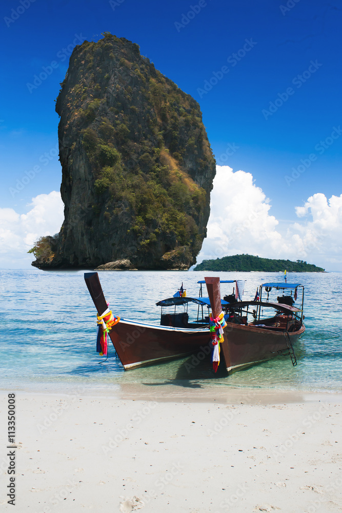 Fototapeta premium Thai traditional boats on Railay Beach, Krabi province, Thailand