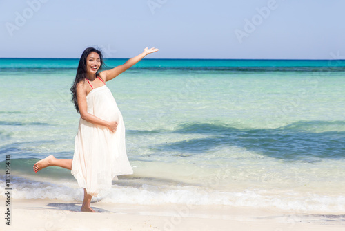 pregnant woman on the beach