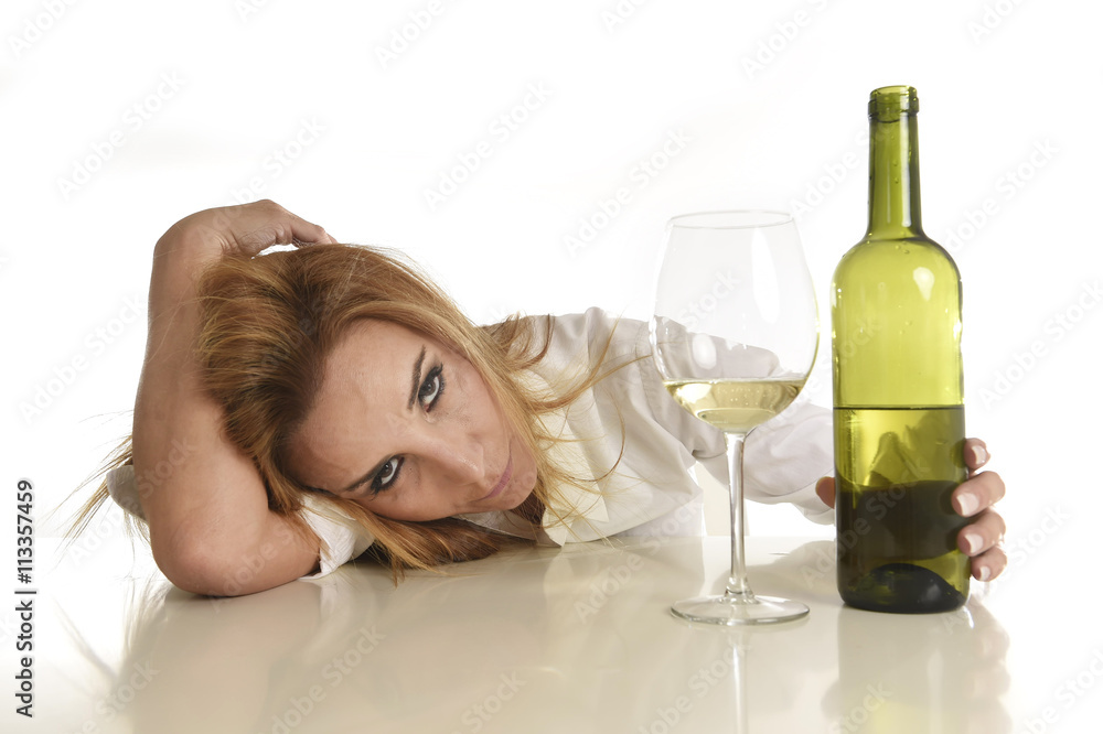 blond wasted and depressed alcoholic drunk woman drinking white wine glass desperate sad blond wasted and depressed alcoholic drunk woman drinking white wine glass desperate sad